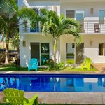A pool in front of a house